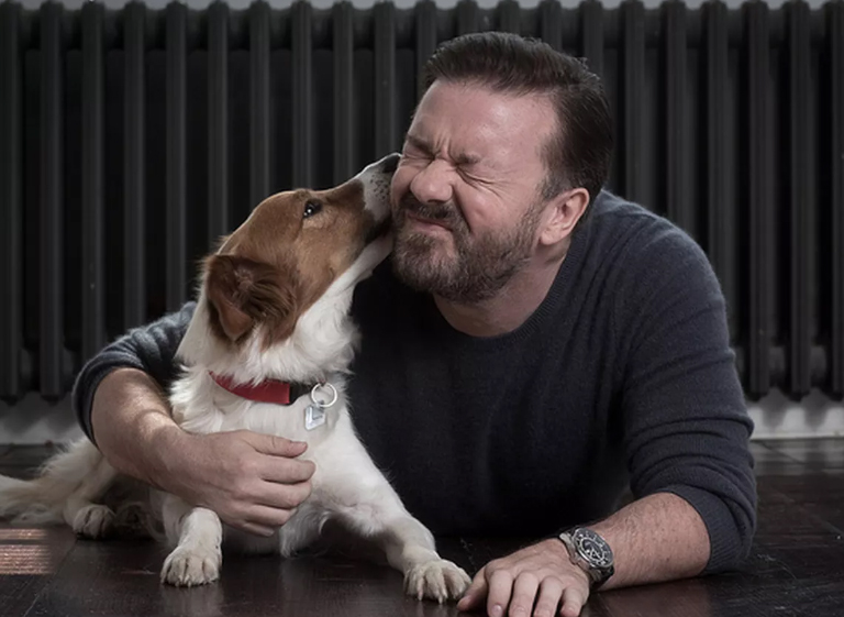 Ricky Gervais With A Dog